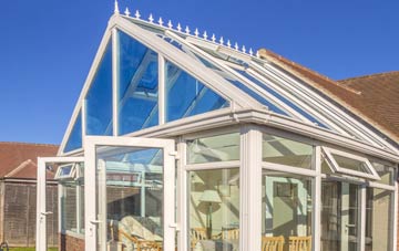 conservatory roof insulation costs College Milton